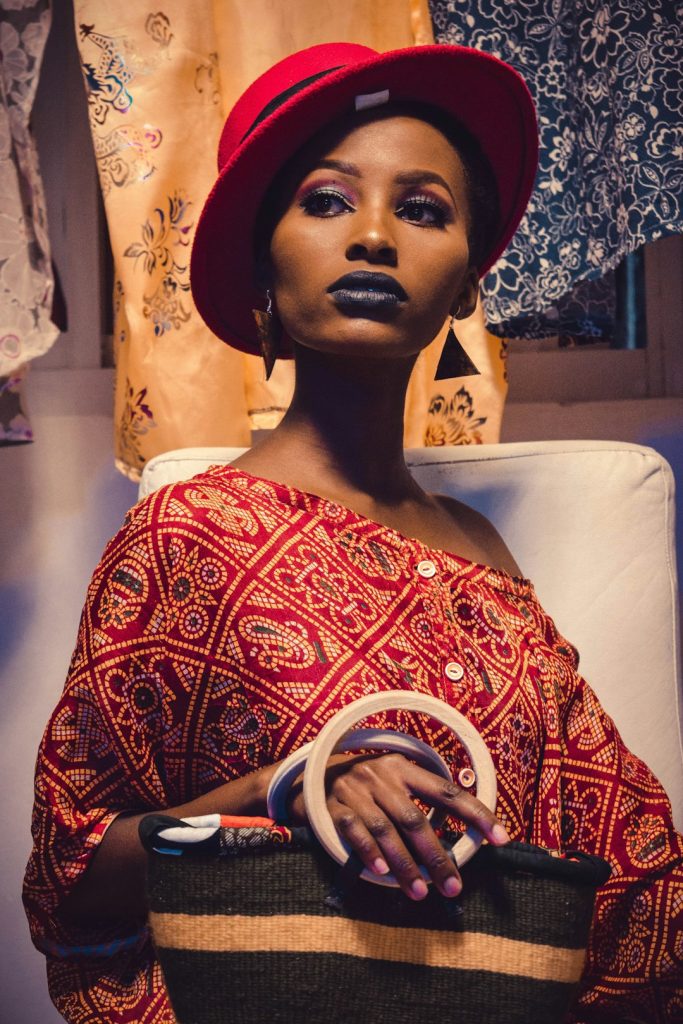 woman-in-red-and-white-floral-dress-dvmryuullgk